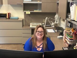 Staff member Nicole from ID_9f6508