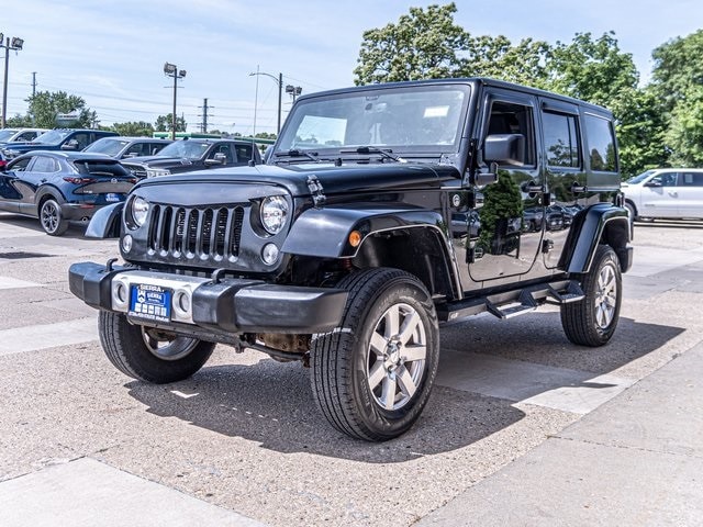 Used 2015 Jeep Wrangler Unlimited Sahara with VIN 1C4BJWEG5FL742531 for sale in Ottawa, IL