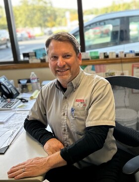 Staff member STEVE LANE from b85c24a634fa