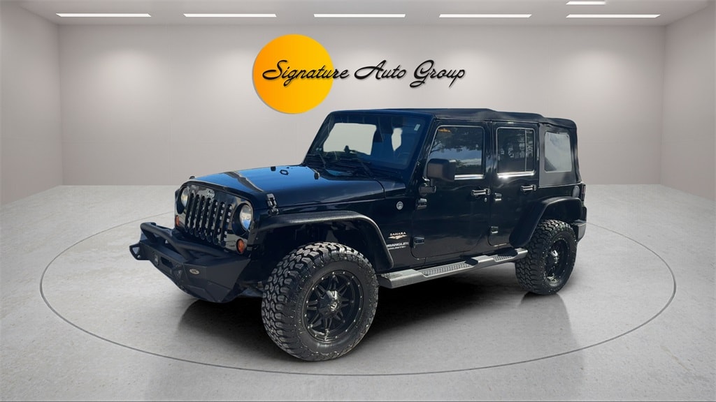 Used 2013 Jeep Wrangler Unlimited Sahara SUV