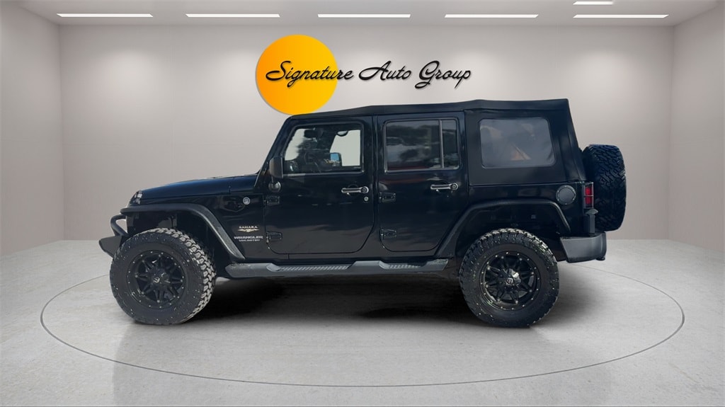 Used 2013 Jeep Wrangler Unlimited Sahara SUV