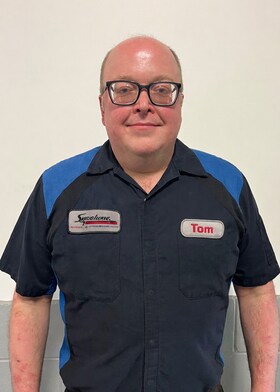 Staff member Thomas Deneau from 369d6f05e476