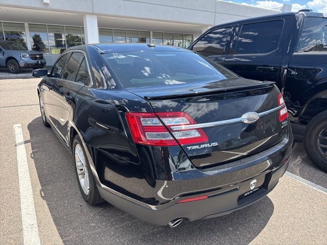 Used 2016 Ford Taurus SEL with VIN 1FAHP2E86GG141591 for sale in Broomfield, CO
