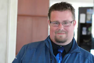 Staff member Scott Peterson from bec34340ad7e