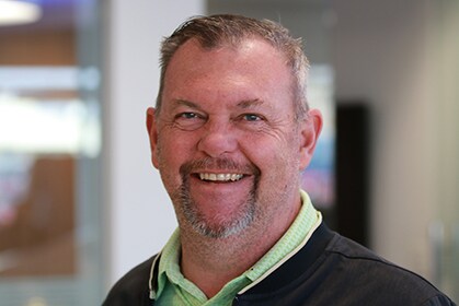 Staff member Greg Larson from 4ae731c1eb07