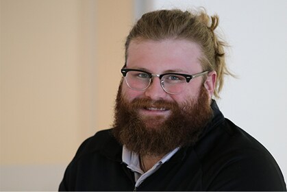Staff member Collin Knaley from a3e90378c3e1