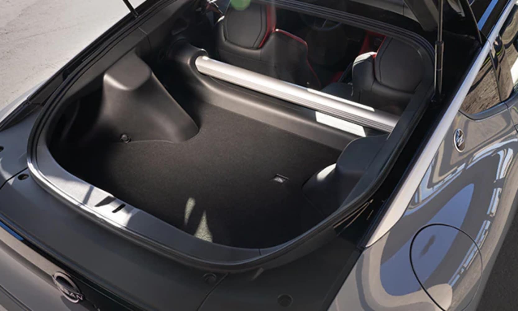 Top view image of a gray 2025 Nissan Z trunk space with the door opened