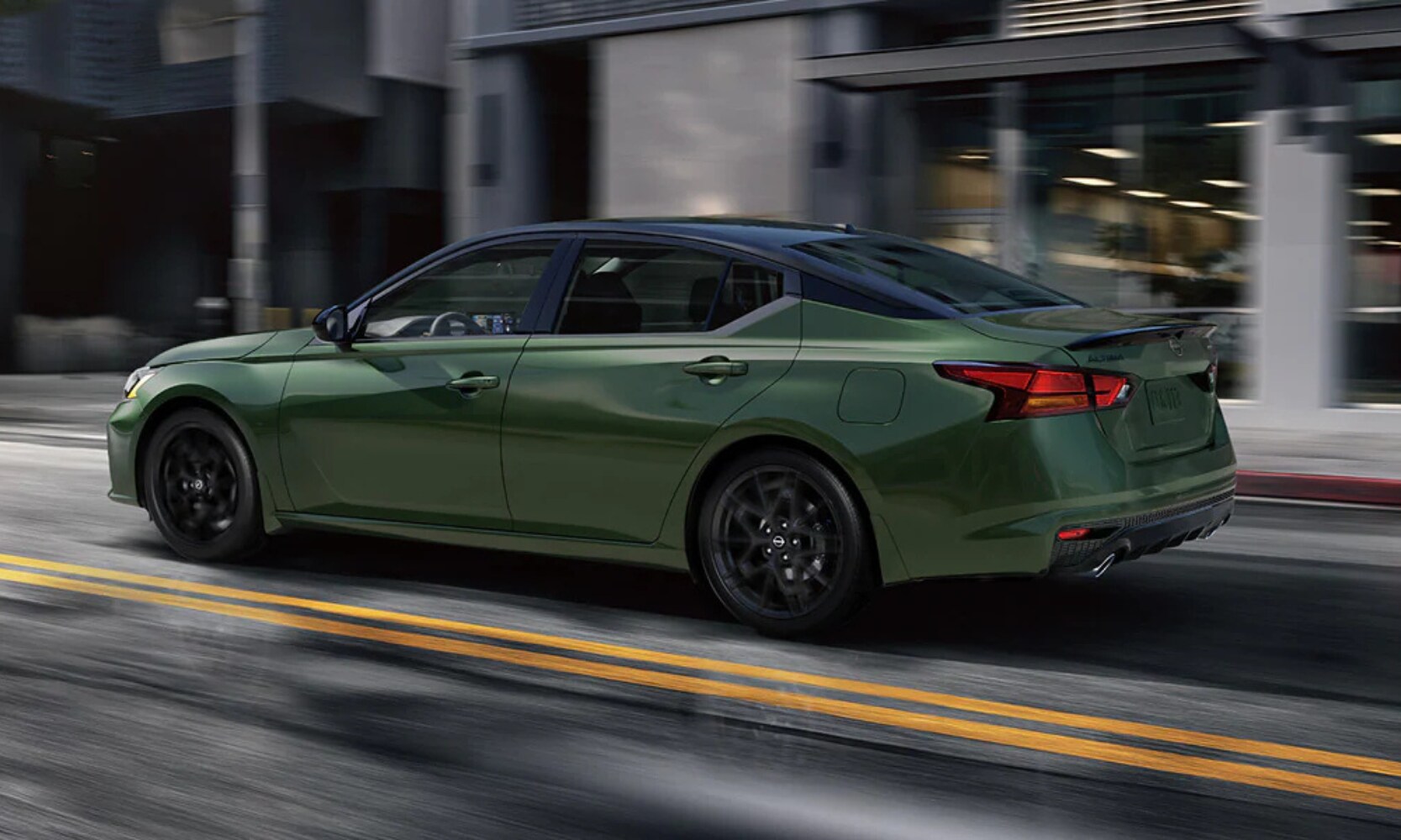 Exterior side image of a green 2026 Nissan Altima SR driving on a city street