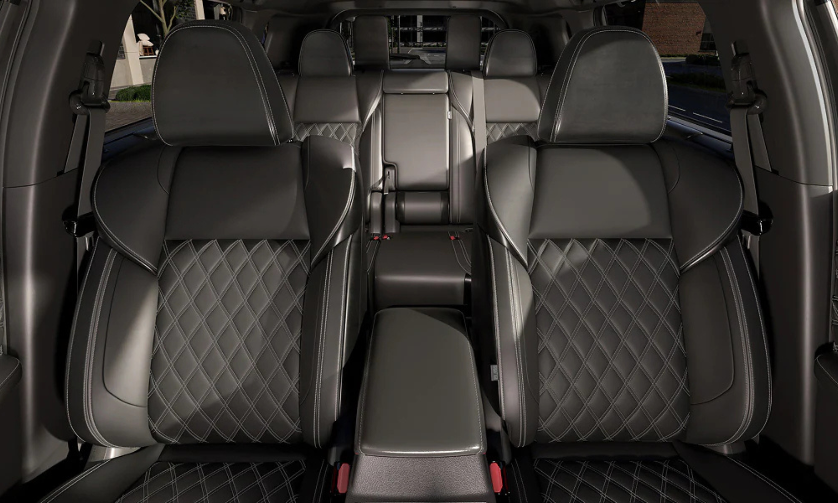 Interior image of 2026 Nissan Rogue Plug-In Hybrid black quilted three-row seating