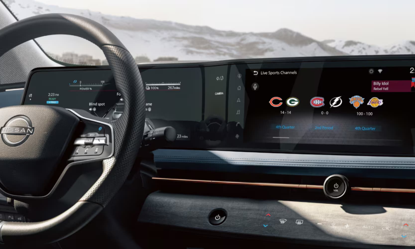 Close-up image of the 2026 Nissan ARIYA dual infotainment screens on the dashboard