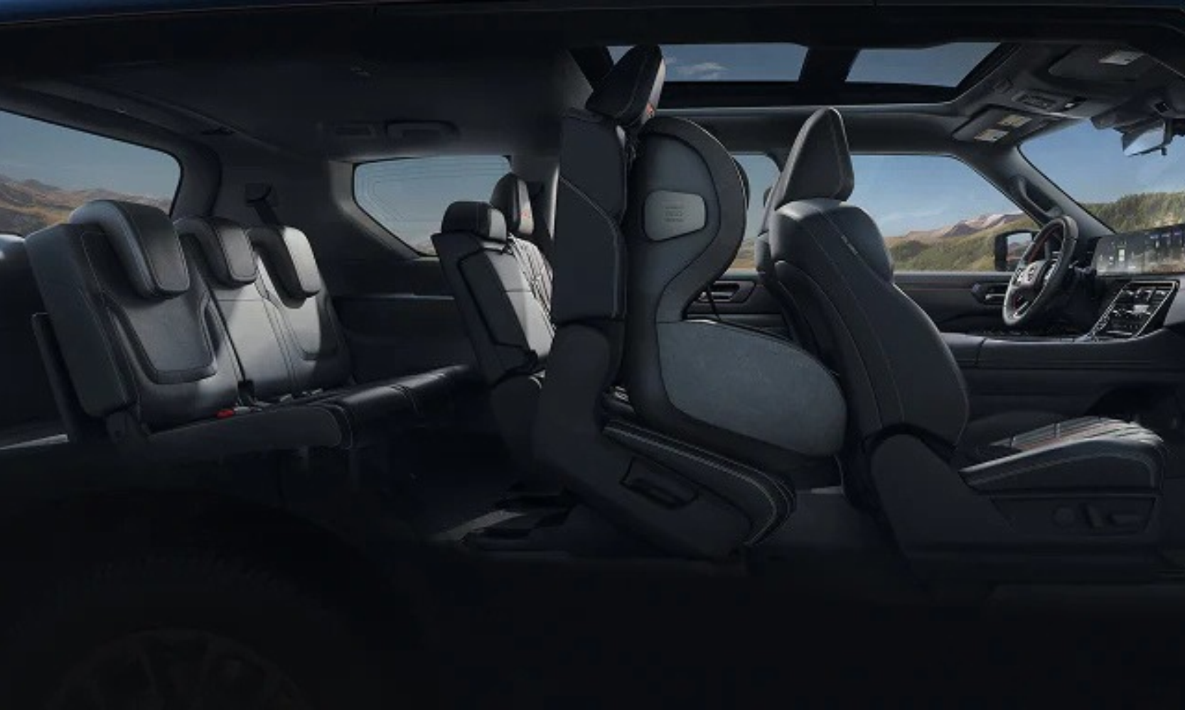 Interior image of the 2027 Nissan Armada's EZ FLEX second-row seating system with it tilted forward