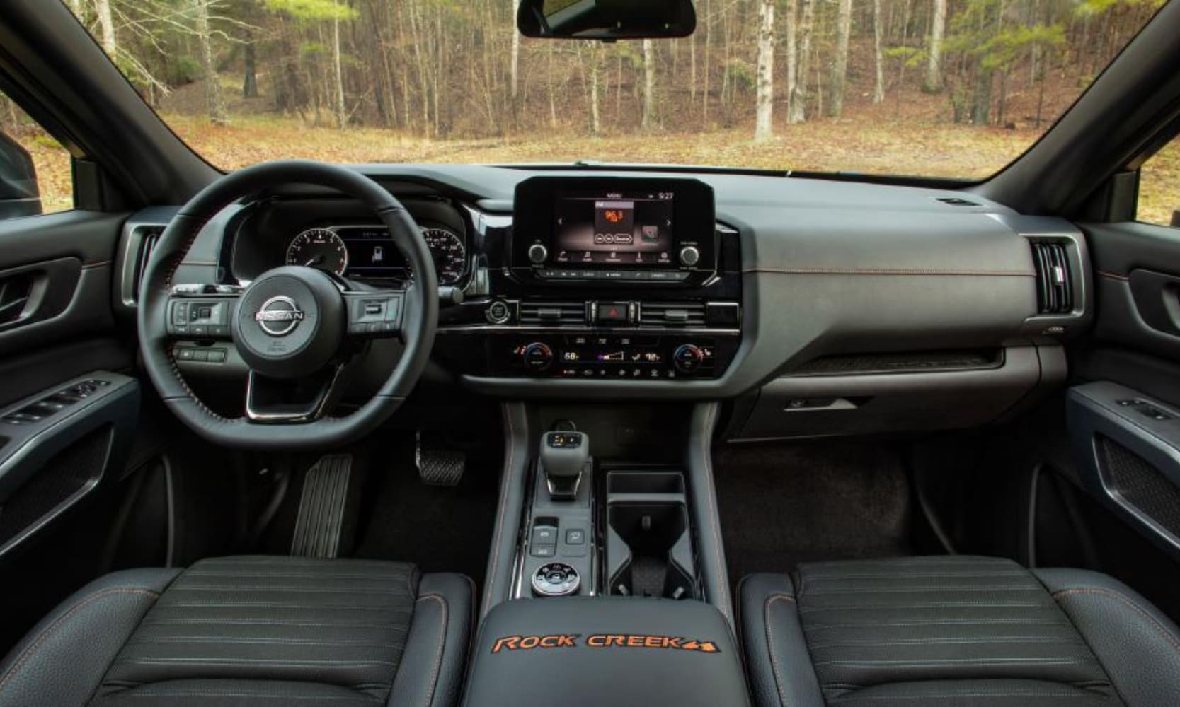 Interior image of the 2025 Nissan Pathfinder Rock Creek front seating area