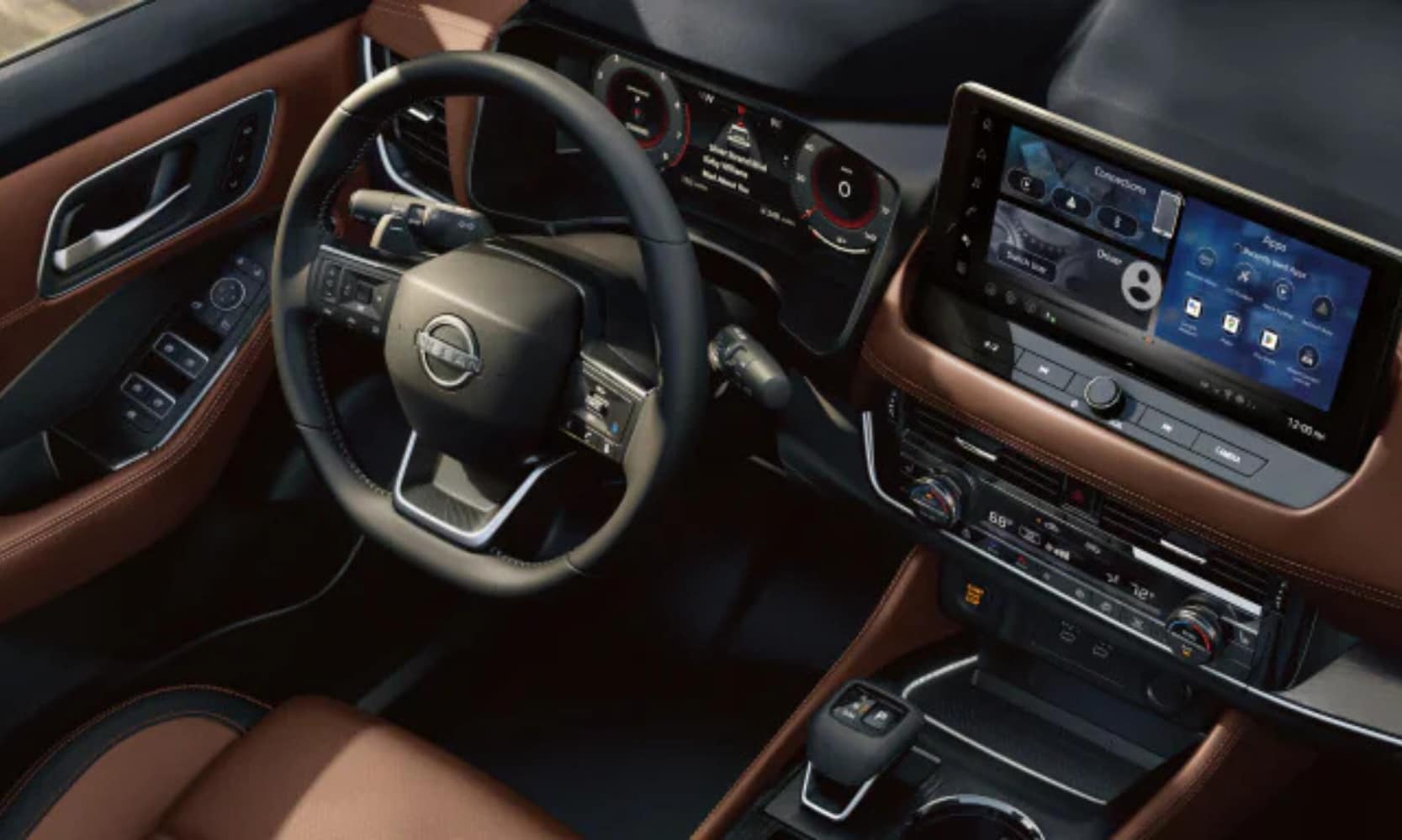 Top-view interior image of a 2025 Nissan Rogue tan front seating area, infotainment system, and steering wheel