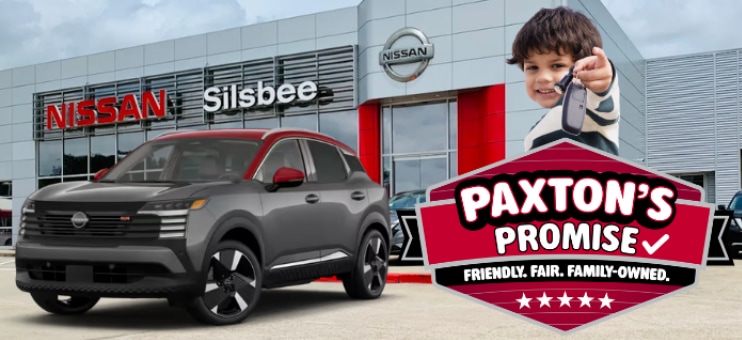 Paxton Nissan dealership with Paxton's Promise badge