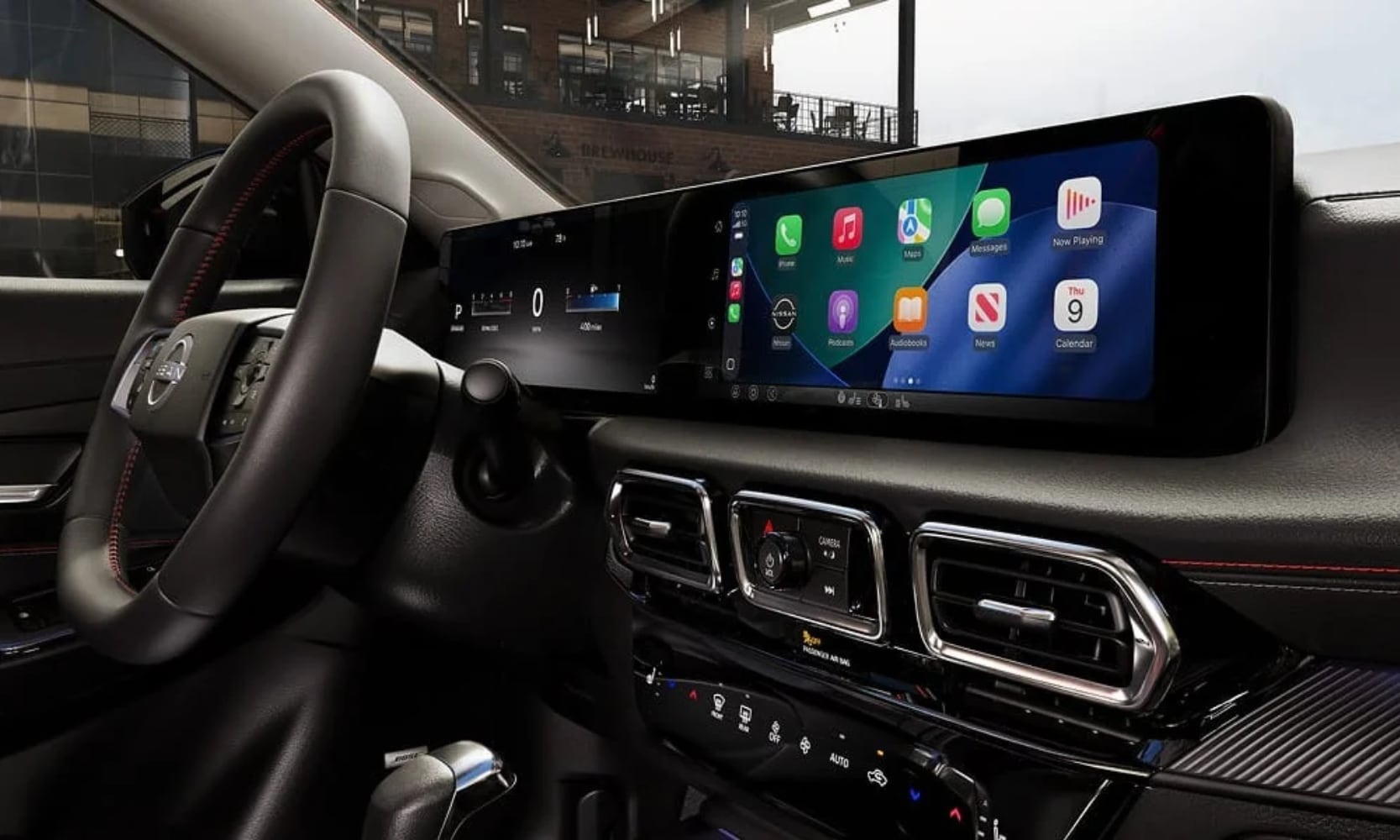 Interior close-up image of a 2027 Nissan Sentra SR's infotainment system