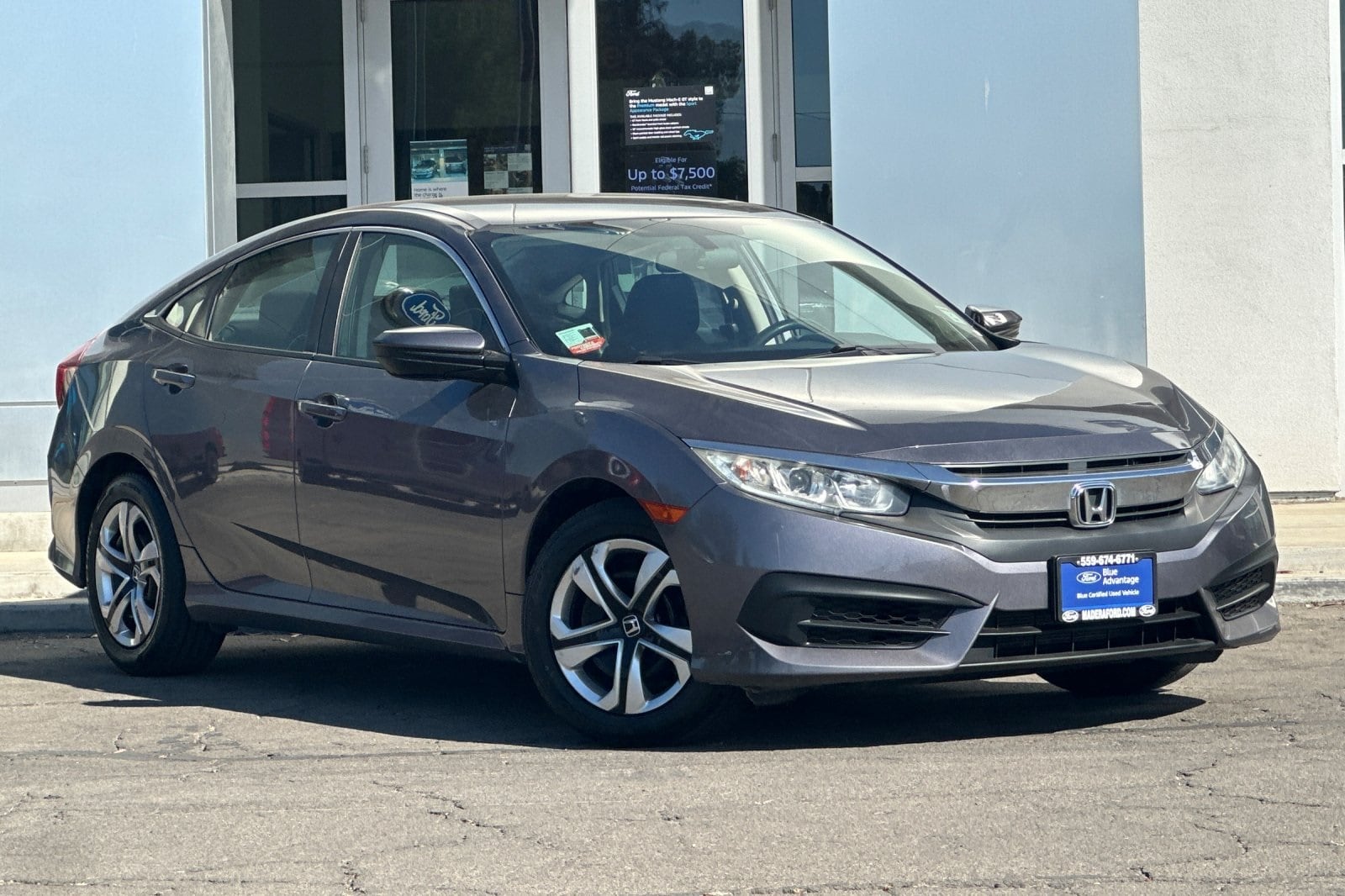Certified 2018 Honda Civic LX with VIN 19XFC2E51JE016069 for sale in Madera, CA