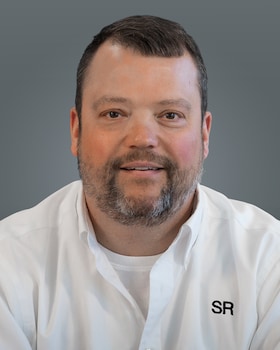 Staff member Mike Campbell from ID_283275