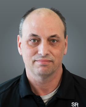 Staff member Dennis Scott from 1c0cda6cc785