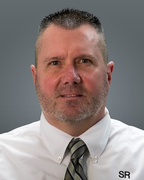 Staff member Gregory Mackey from ID_4880a0