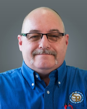 Staff member John Little from 3d37cab5721c