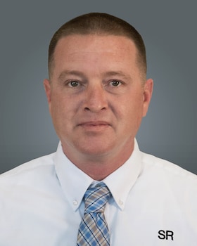 Staff member Joseph Maynard from 1dea1ee99c4b