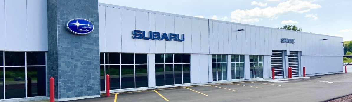  Person cheerfully signing documents.