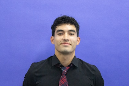Staff member Elijah Nunez from 7c506a21902e