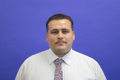 Staff member Emilio Lopez from 7c506a21902e