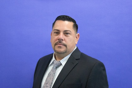 Staff member Carlos Soriano from 7c506a21902e
