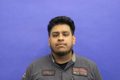 Staff member Miguel Dianas from 8479604501e0