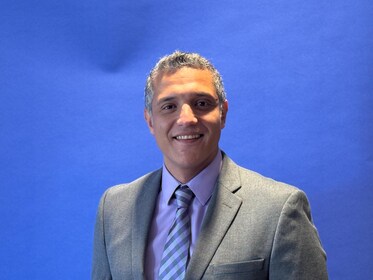 Staff member Peter Nour from ID_abca16e40fa3