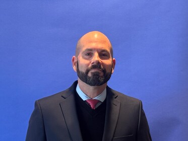Staff member Andrew McElroy from ID_cd8162085aae