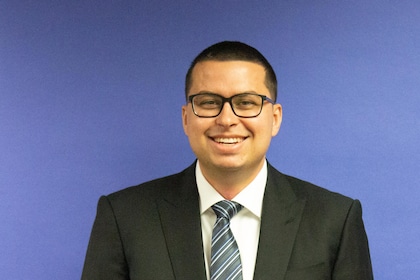 Staff member Alex Simpson from ID_0e2feda59ccd