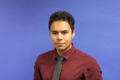 Staff member Tyler Gartner from ID_2bc4cf379212