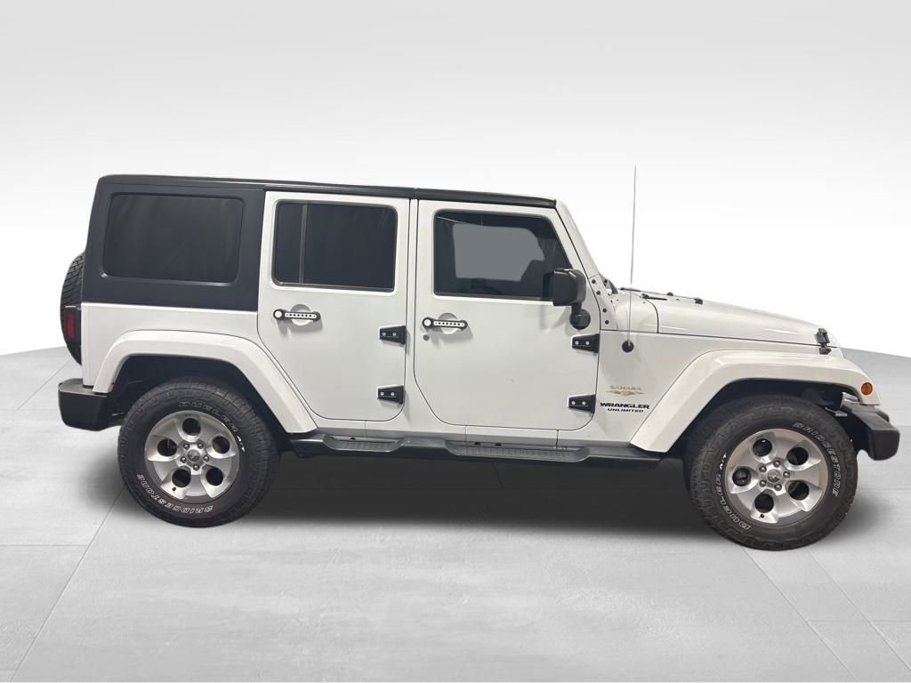 Used 2015 Jeep Wrangler Unlimited Sahara with VIN 1C4BJWEG0FL753050 for sale in Warren, OH