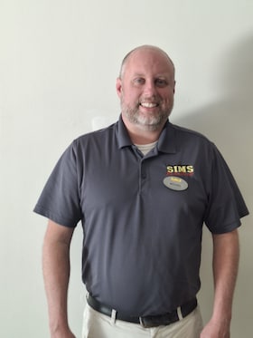 Staff member Michael Novak from b449a0757600