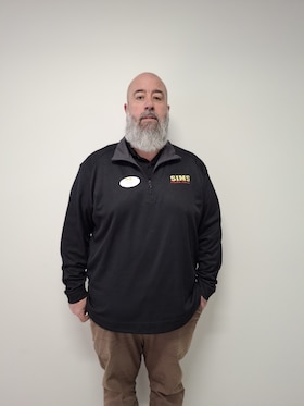 Staff member Ron Edwards from b449a0757600