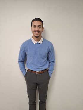 Staff member Devin Wilson from 56624cd63388