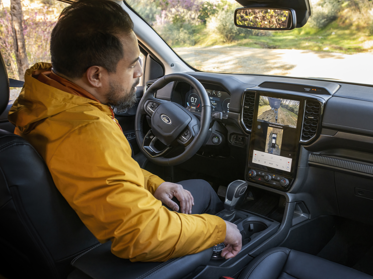 Driver using towing camera view from the interior of a 2026 Ford Ranger
