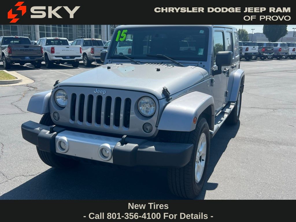 Used 2015 Jeep Wrangler Unlimited Sahara with VIN 1C4BJWEG8FL526415 for sale in Provo, UT