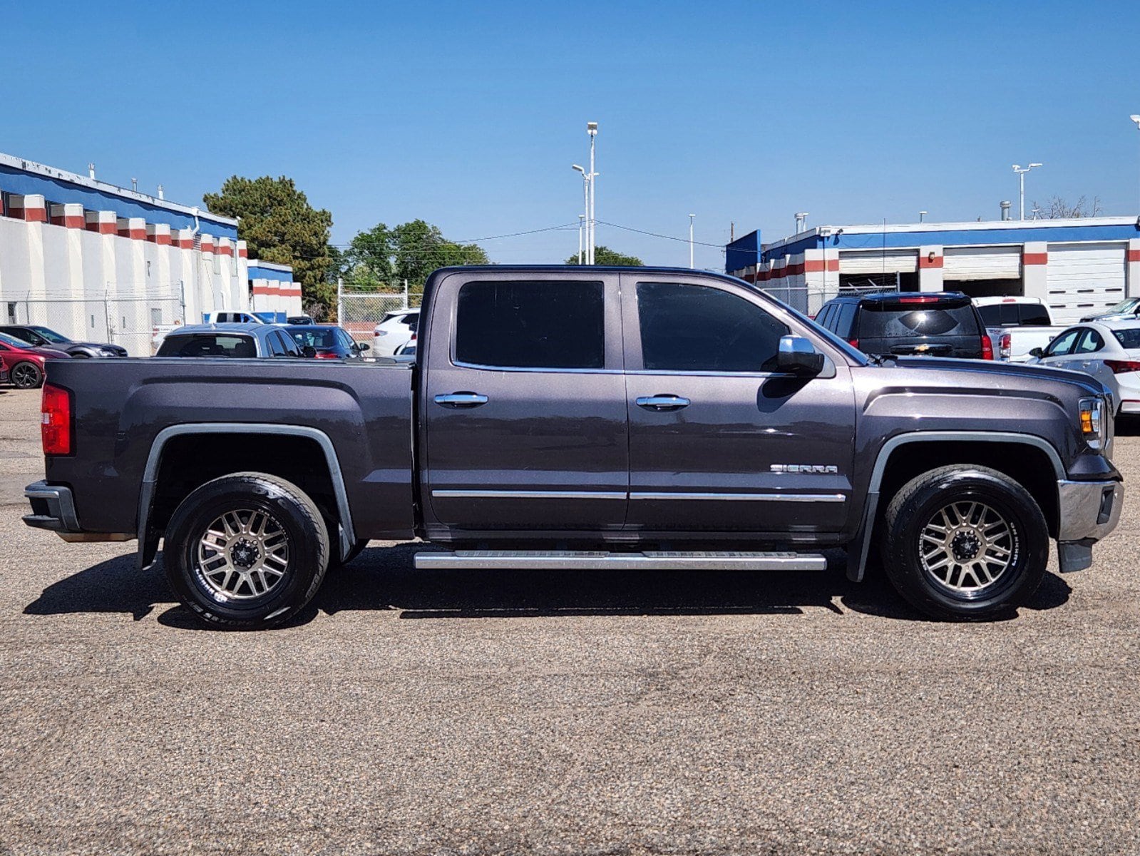 Used 2015 GMC Sierra 1500 SLT with VIN 3GTP1VEC7FG222406 for sale in Thornton, CO