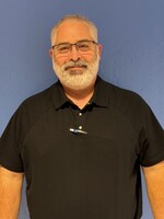 Staff member Tim Young from ID_978524