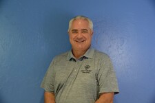 Staff member Chuck O'Brien from ID_970846