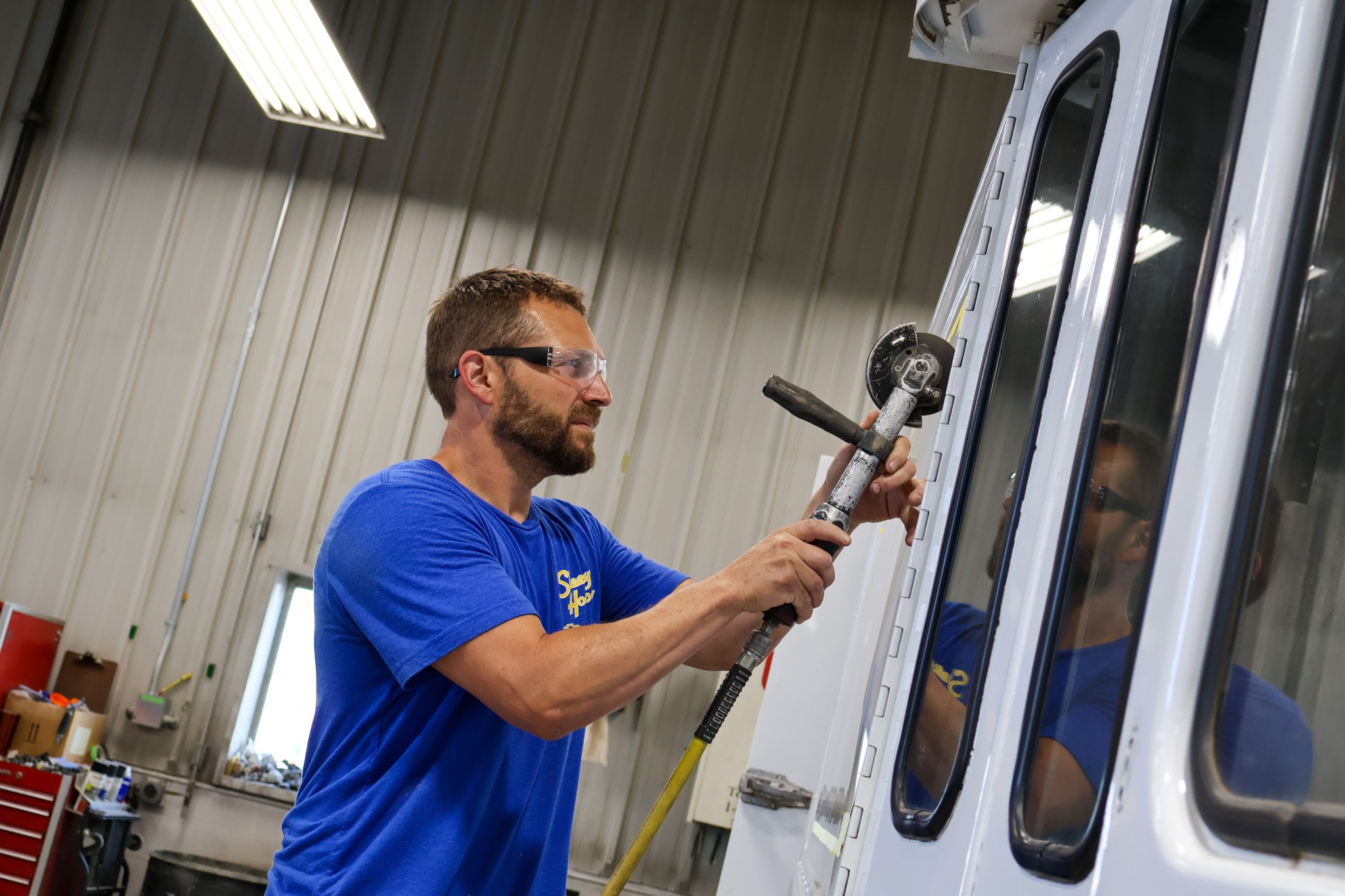 Sleepy Hollow Collision Center technician performing structural repair