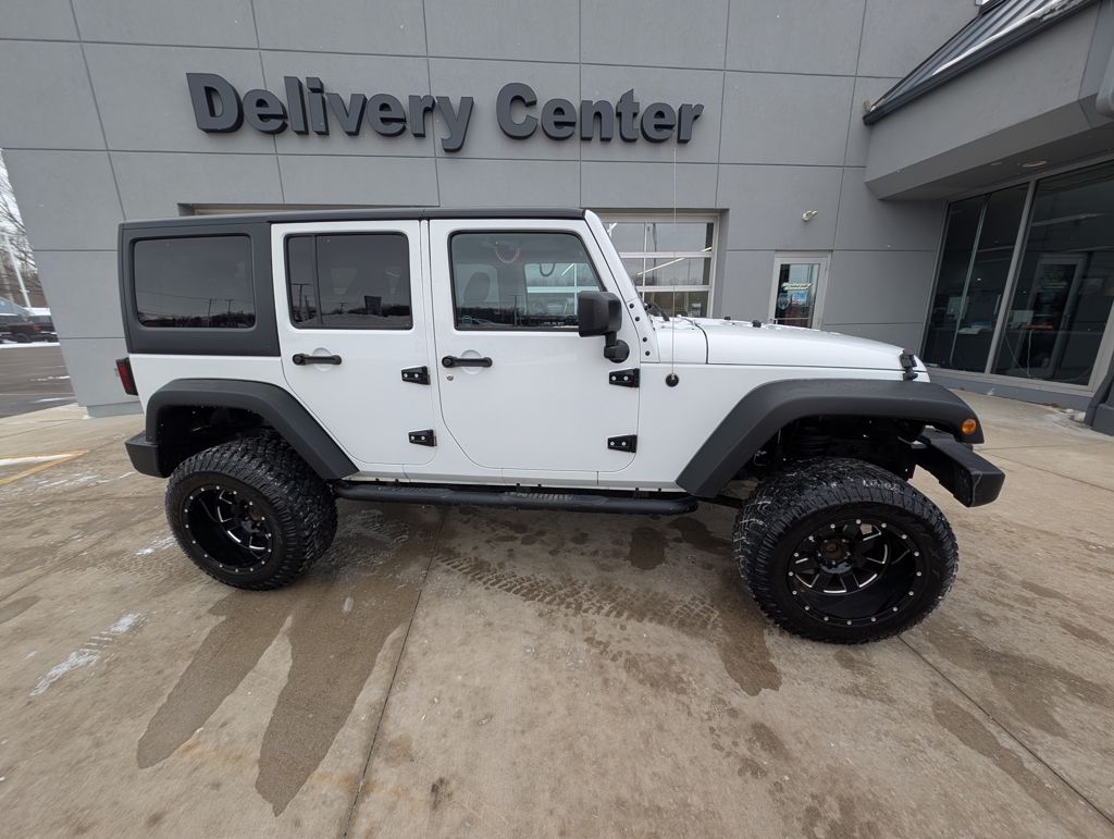 Used 2017 Jeep Wrangler Unlimited Sport S with VIN 1C4BJWDG4HL606685 for sale in Amherst, OH
