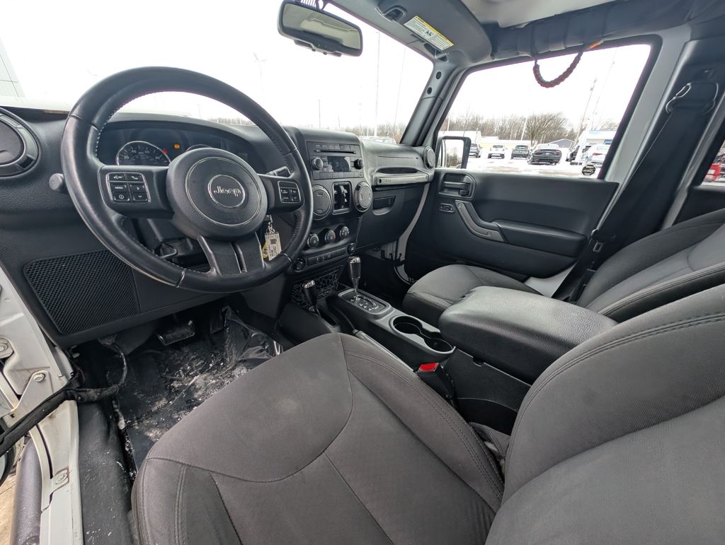 Used 2017 Jeep Wrangler Unlimited Sport S with VIN 1C4BJWDG4HL606685 for sale in Amherst, OH