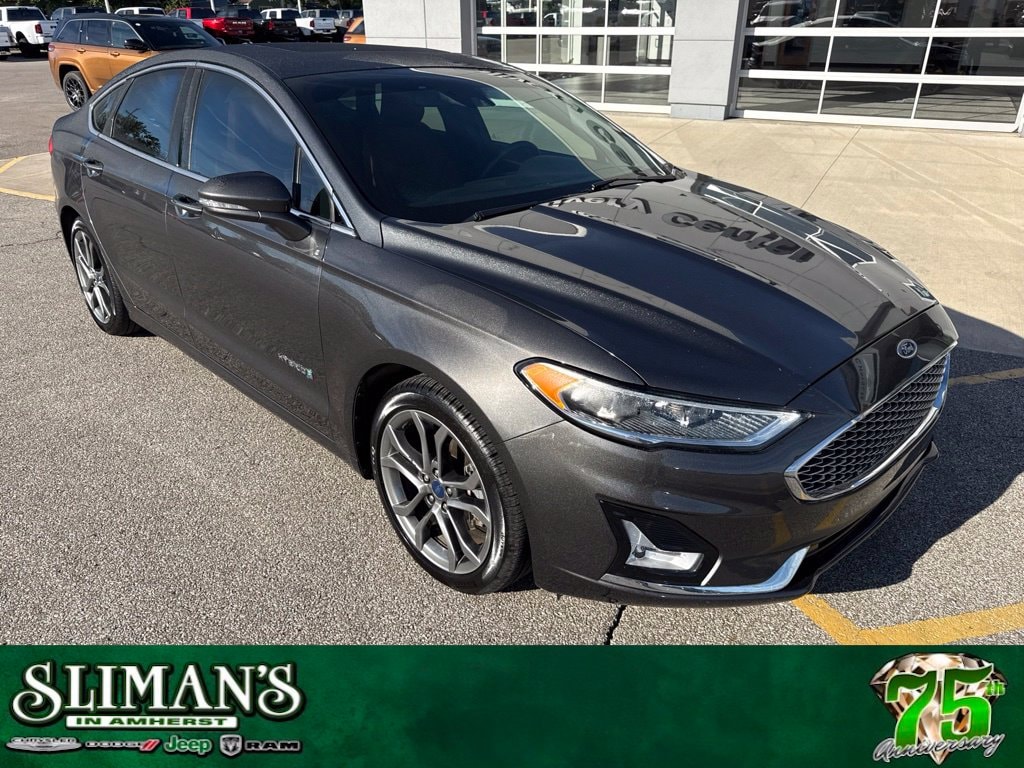 Used 2019 Ford Fusion Hybrid Titanium with VIN 3FA6P0RU3KR277200 for sale in Amherst, OH