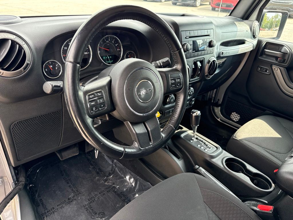 Used 2017 Jeep Wrangler Unlimited Sport S with VIN 1C4BJWDG4HL710934 for sale in Amherst, OH