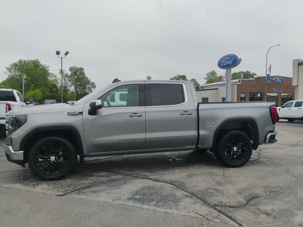 Used 2024 GMC Sierra 1500 SLE with VIN 1GTUUBED7RZ285429 for sale in Oconto Falls, WI
