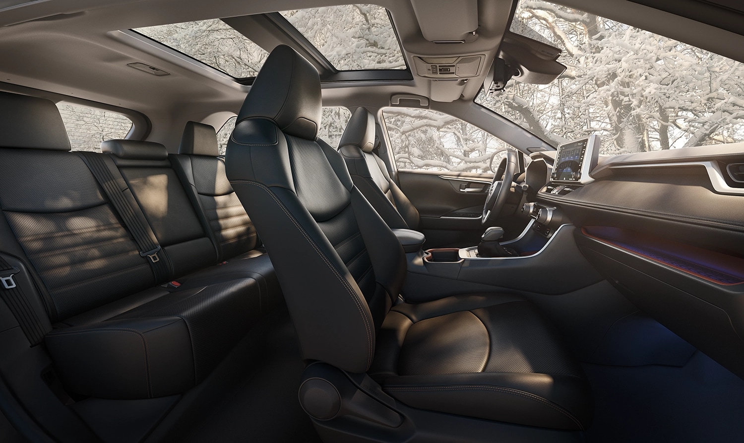 Interior space between the two rows of a 2023 Toyota Rav4 Midsize SUV.